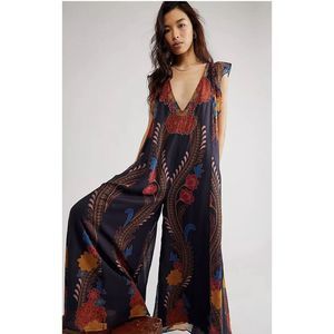 NWT Free People Magical Jumpsuit Size L. A48